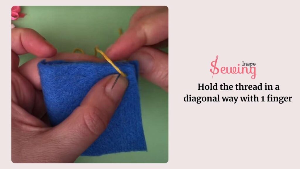 hold the thread in a diagonal way with 1 finger