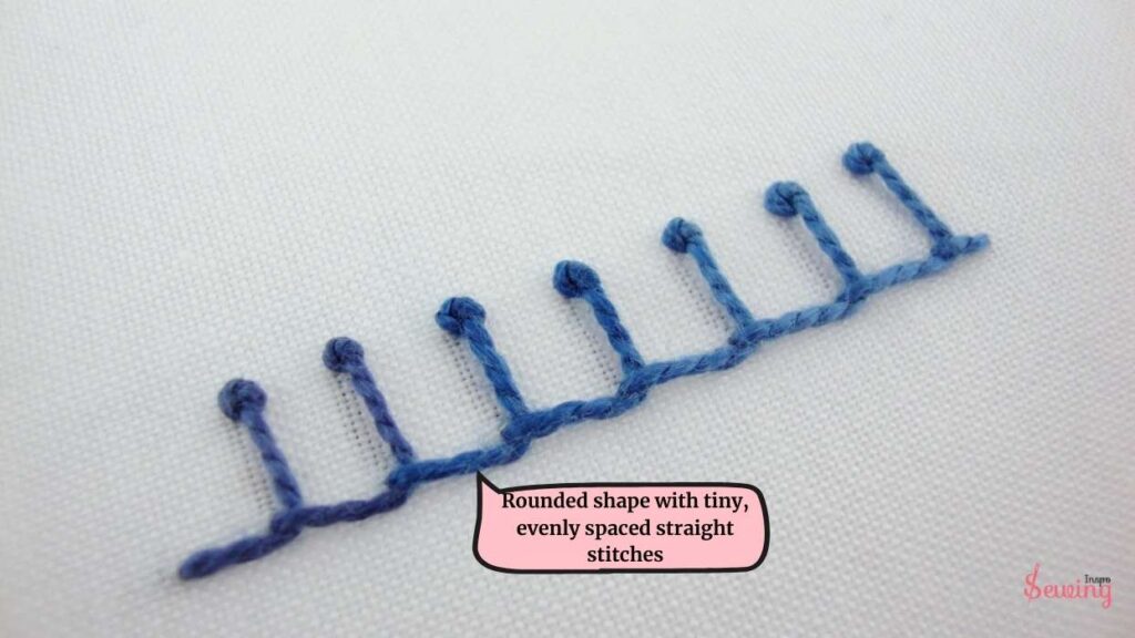 rounded shape with tiny, evenly spaced straight stitches