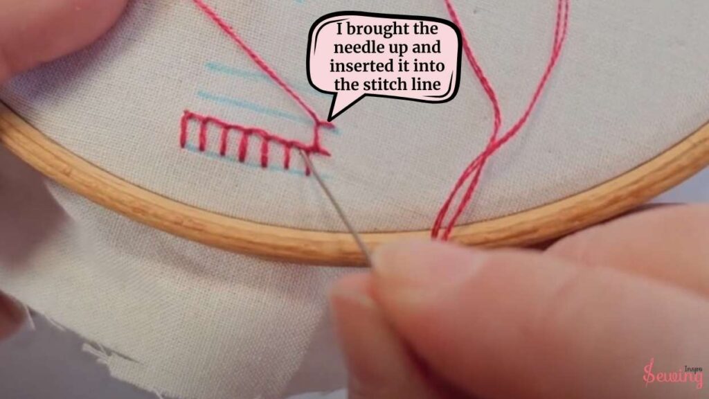 I brought the needle up and inserted it into the stitch line