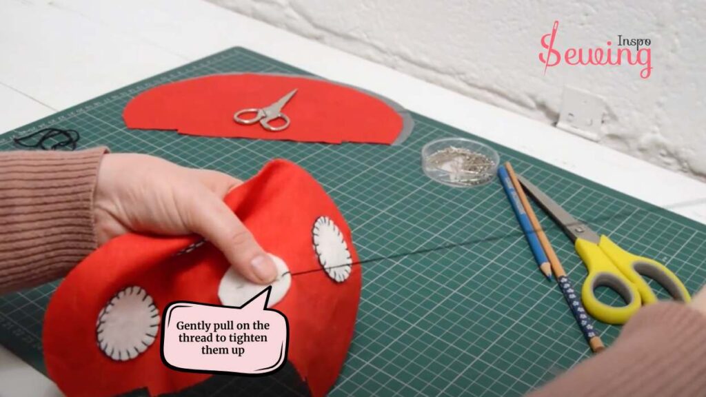 gently pull on the thread to tighten them up