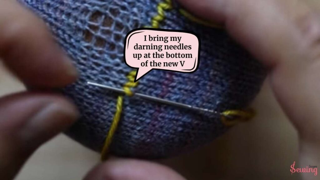 I bring my darning needles up at the bottom of the new V