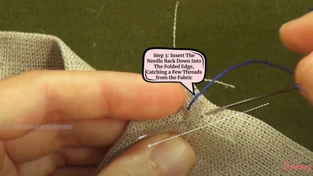 Insert The Needle Back Down Into The Folded Edge, Catching a Few Threads From the Fabric