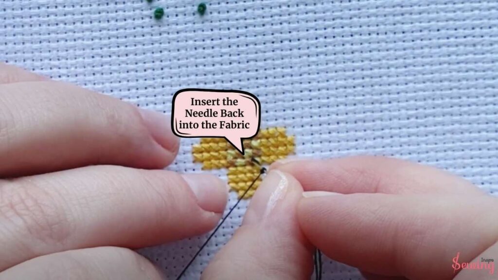 Insert the Needle Back into the Fabric