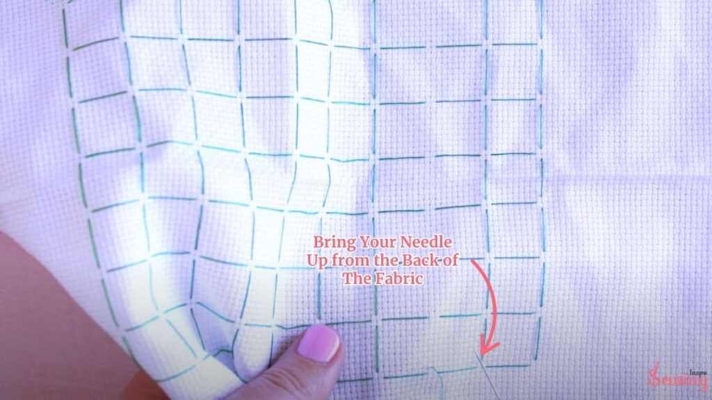 Bring Your Needle Up From The Back Of The Fabric