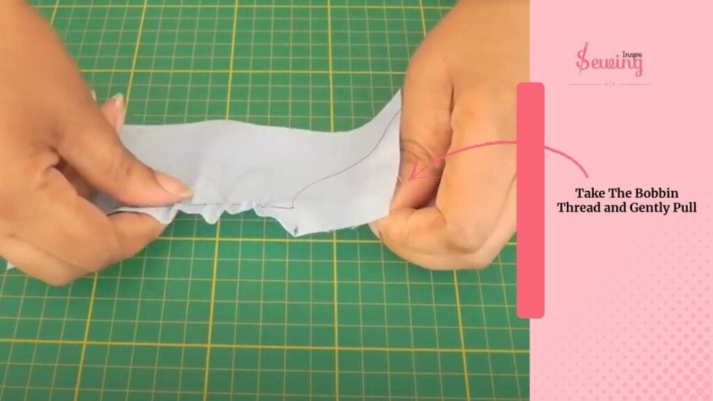Take The Bobbin Thread And Gently Pull