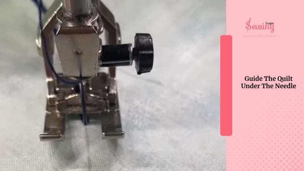 Guide The Quilt Under The Needle