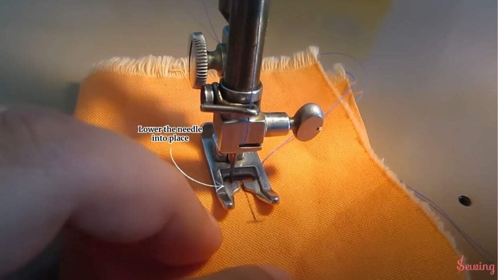 Lower the needle into place
