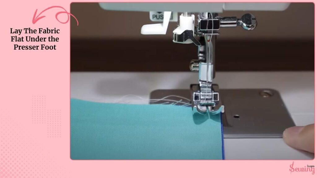 Lay The Fabric Flat Under The Presser Foot