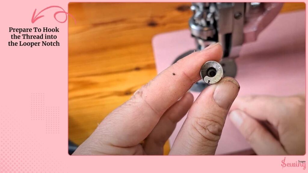Prepare To Hook The Thread Into The Looper Notch