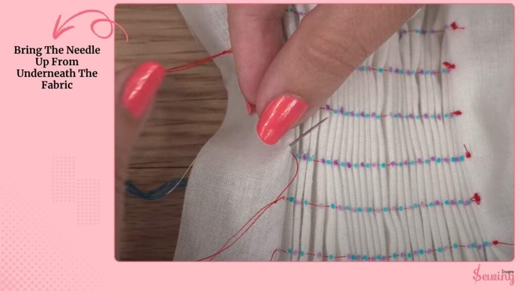 Bring The Needle Up From Underneath The Fabric