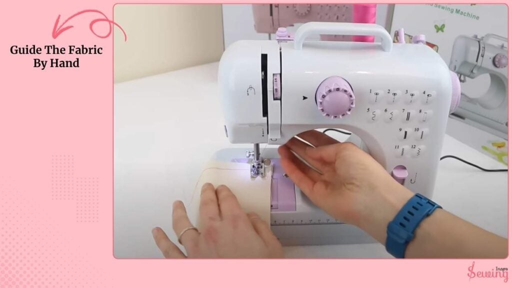 Guide The Fabric By Hand