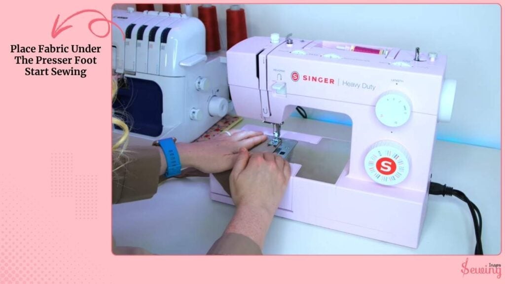 Place Fabric Under The Presser Foot Start Sewing